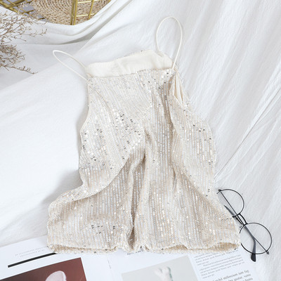 Peenikeste rihmade ja litritega läikiv naiste topp