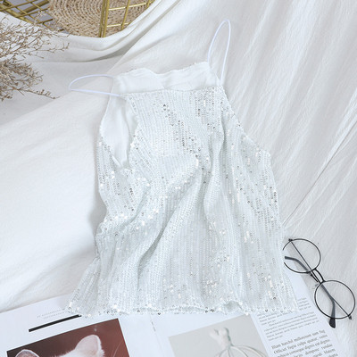 Peenikeste rihmade ja litritega läikiv naiste topp