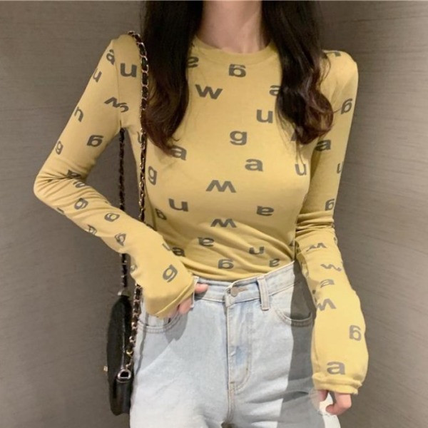 Lezser női blúz hosszú ujjal és ovális nyakkivágással