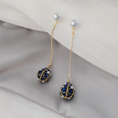 Moodsad pikad naiste kõrvarõngad kivide ja pärlitega