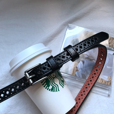 Női alkalmi bőr öv fém csattal és kivágásokkal