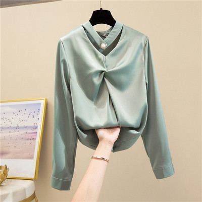 Moodne pärlite ja pikkade varrukatega naiste särk