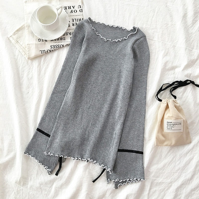 Modern női blúz kerek nyakkivágással és nyakkendővel