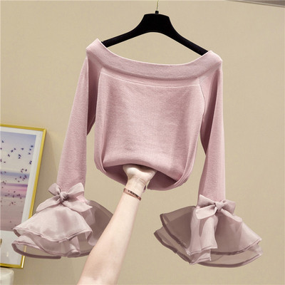 Modern női blúz csónakos nyakkivágással és hosszú ujjú szalaggal