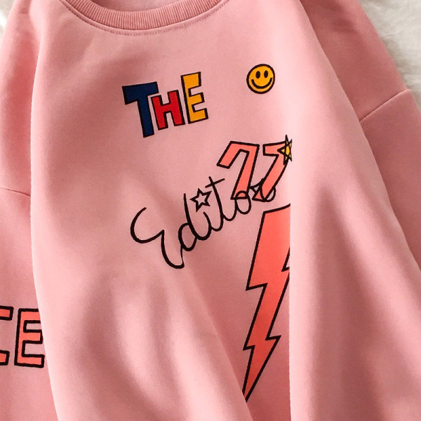 Rózsaszín női blúz kerek nyakkivágással és rátéttel