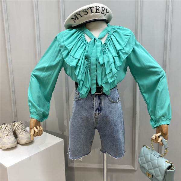 Modern női ing szalaggal és hosszú ujjal