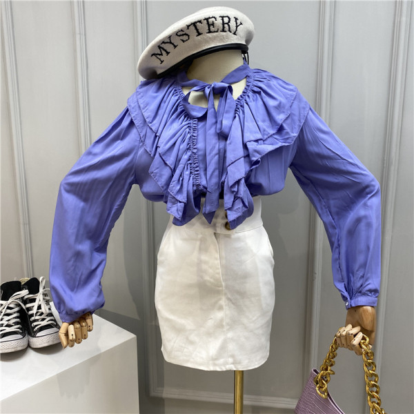 Modern női ing szalaggal és hosszú ujjal