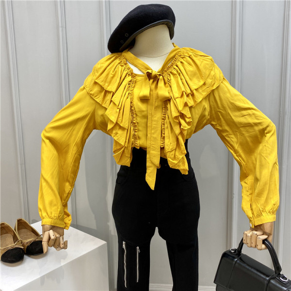 Modern női ing szalaggal és hosszú ujjal