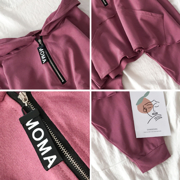 Napi női pulóver cipzárral és kapucnival