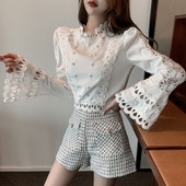 Stiilne naiste lootosevarrukate ja pärlitega pluus