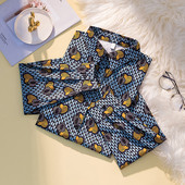 Suur pikkade varrukate ja värvilise südamemustriga naiste särk