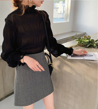 Suures suuruses kõrge krae ja pikkade varrukatega naiste šifoonist särk