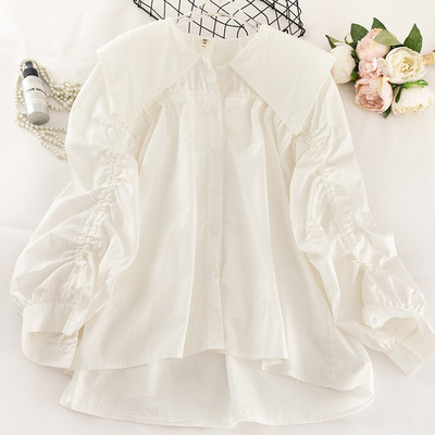 Модерна дамска риза с връзки на ръкавите и класическа яка асиметричен модел