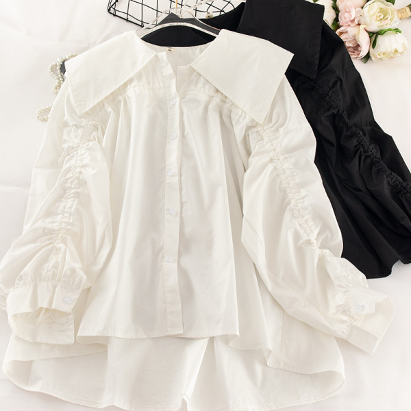 Модерна дамска риза с връзки на ръкавите и класическа яка асиметричен модел