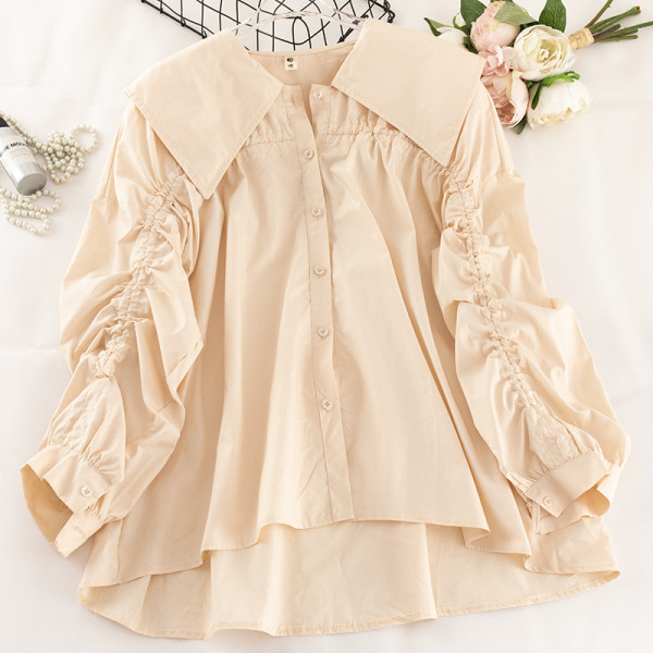 Модерна дамска риза с връзки на ръкавите и класическа яка асиметричен модел