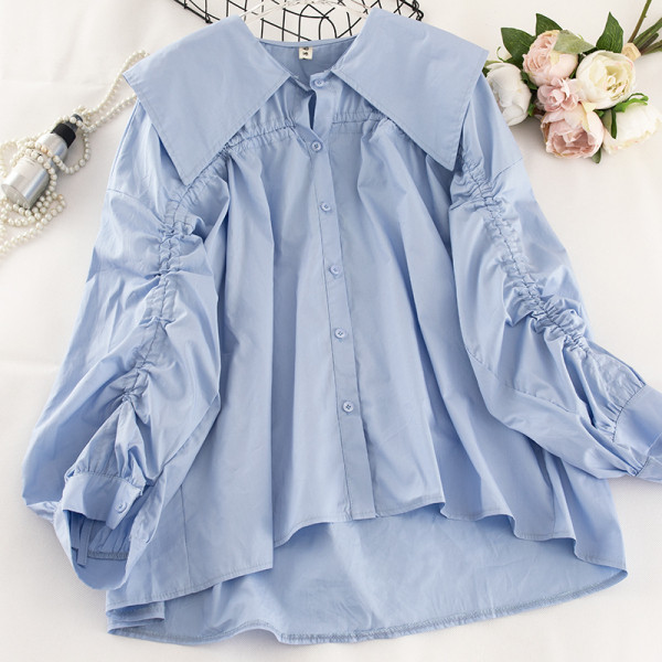 Модерна дамска риза с връзки на ръкавите и класическа яка асиметричен модел