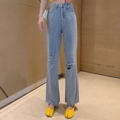 Széles női farmer szakadt motívumokkal, magas derékkal