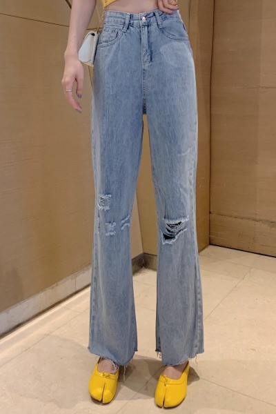 Laiad rebenenud motiividega ja kõrge vöökohaga naiste teksad