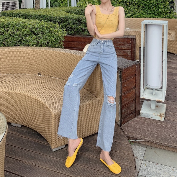 Laiad rebenenud motiividega ja kõrge vöökohaga naiste teksad