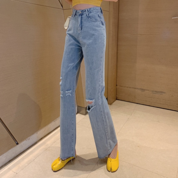 Laiad rebenenud motiividega ja kõrge vöökohaga naiste teksad