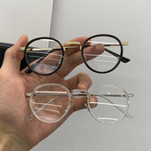 Stiilsed ümara kuju ja metallraamiga naiste prillid