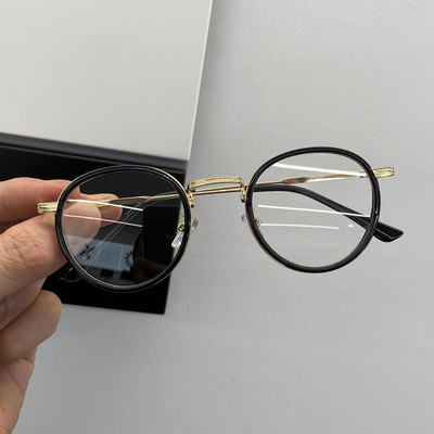 Stiilsed ümara kuju ja metallraamiga naiste prillid