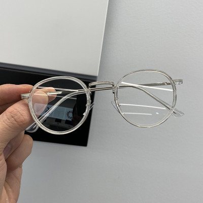 Stiilsed ümara kuju ja metallraamiga naiste prillid