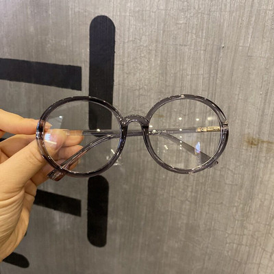 Modern női szemüveg kerek formában, dioptria nélkül