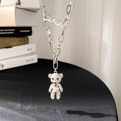 Moodne naiste kaelakee kividega karu kujulise ripatsiga