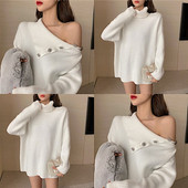 Pikk naiste kampsun allakäivate varrukate ja nööpidega