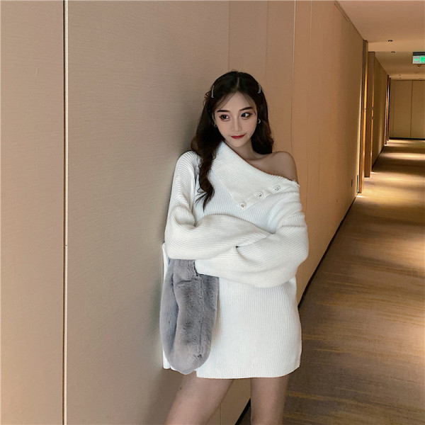 Pikk naiste kampsun allakäivate varrukate ja nööpidega