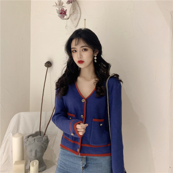 Proljetni ženski prsluk s džepovima i špic izrezom