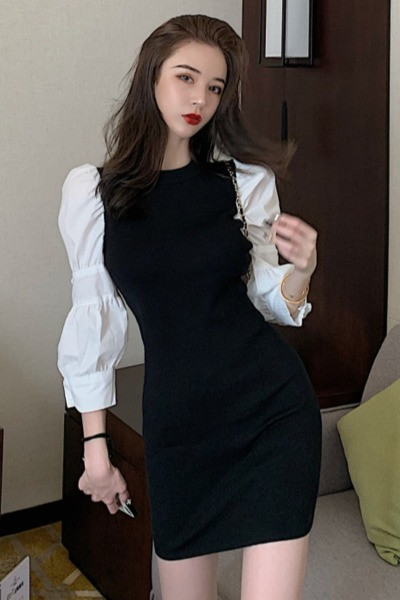 Fekete női ruha fehér puffos ujjakkal