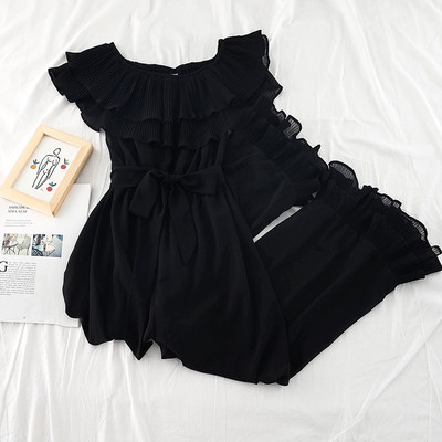 Stílusos női overall széles modell csónakos nyakkivágással és derékövvel