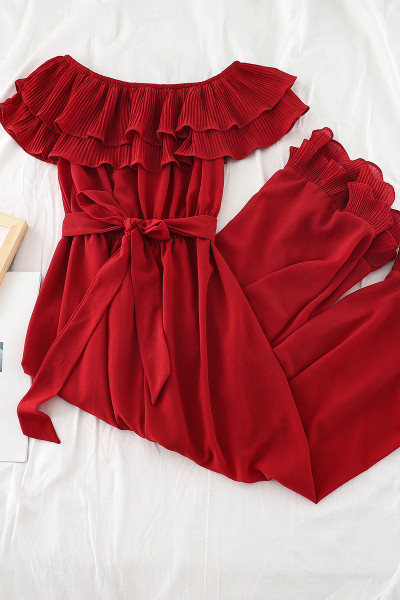 Stílusos női overall széles modell csónakos nyakkivágással és derékövvel