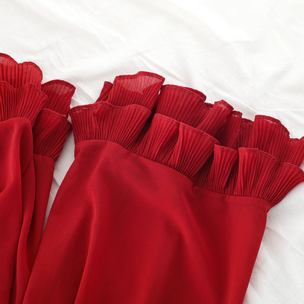 Stílusos női overall széles modell csónakos nyakkivágással és derékövvel