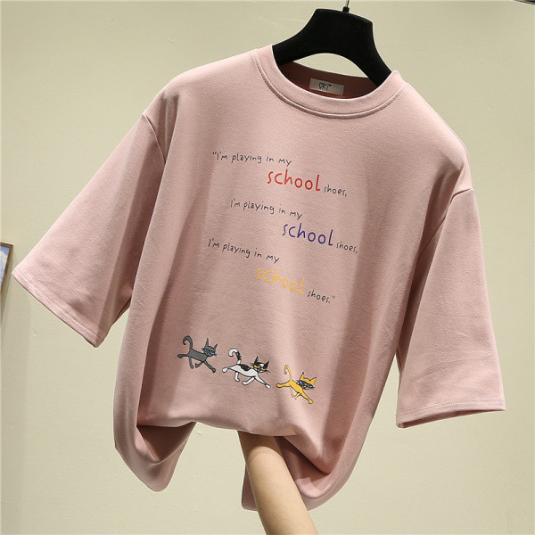 Lai naiste t-särk tikandite ja aplikatsioonidega