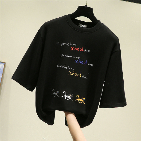 Lai naiste t-särk tikandite ja aplikatsioonidega