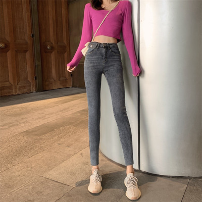 Liibuvad hallid kõrge vöökohaga naiste teksad