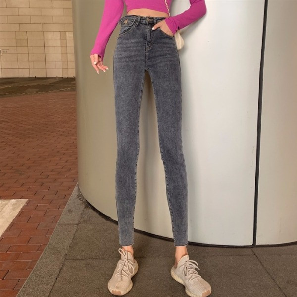 Liibuvad hallid kõrge vöökohaga naiste teksad