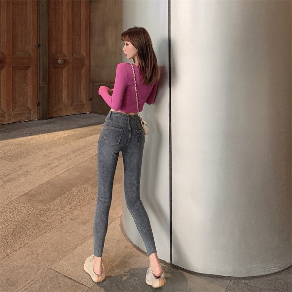 Liibuvad hallid kõrge vöökohaga naiste teksad