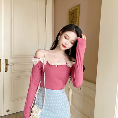 Allakäinud varrukatega ja tüllpaeltega naiste pluus