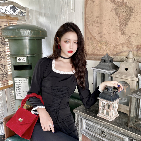 Pikk naiste retrokleit kandilise dekoltee ja lipsudega