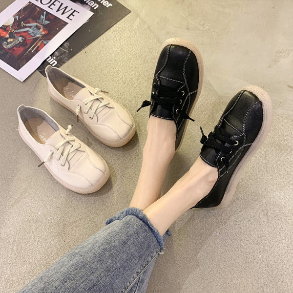 Naiste vabaaja mokassiinid paelte ja madala tallaga