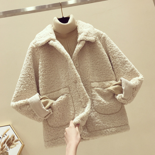 Modern női pehelykabát zsebekkel