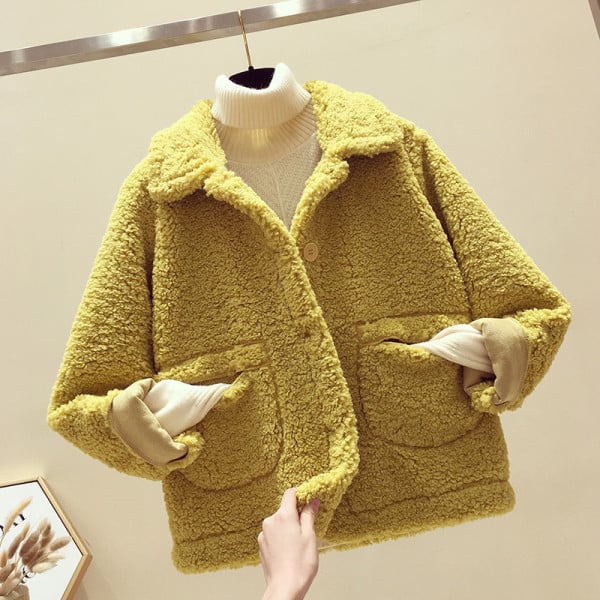 Modern női pehelykabát zsebekkel