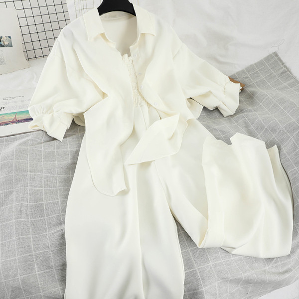 Stiilne naiste komplekt, mis sisaldab 3/4 varrukatega särki ja laia kombinesooni