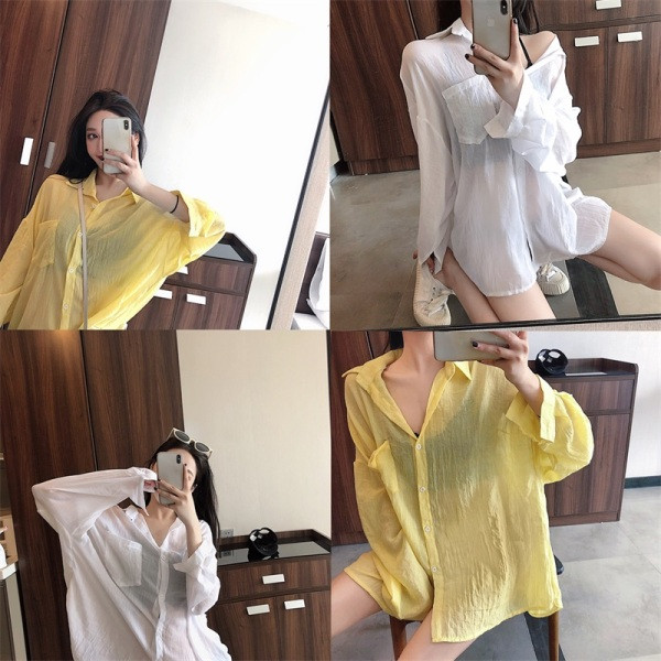 Pikk naiste särk klassikalise krae ja taskutega