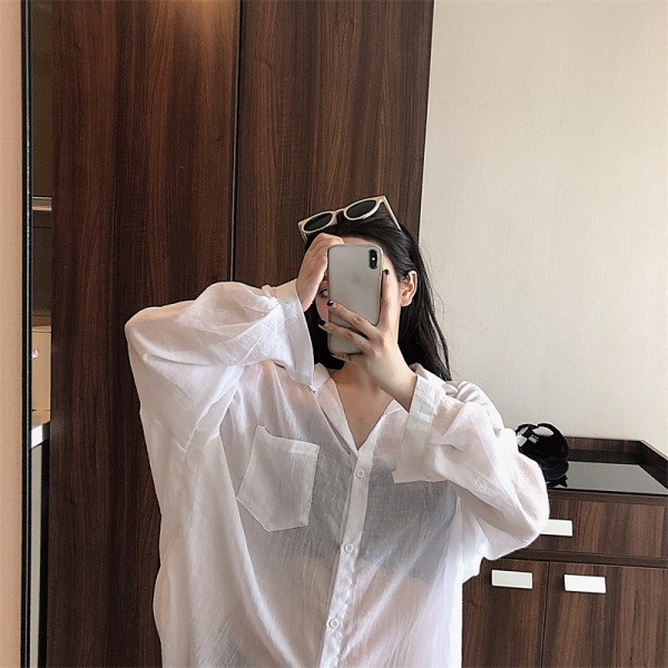 Pikk naiste särk klassikalise krae ja taskutega