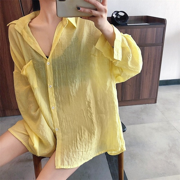 Pikk naiste särk klassikalise krae ja taskutega